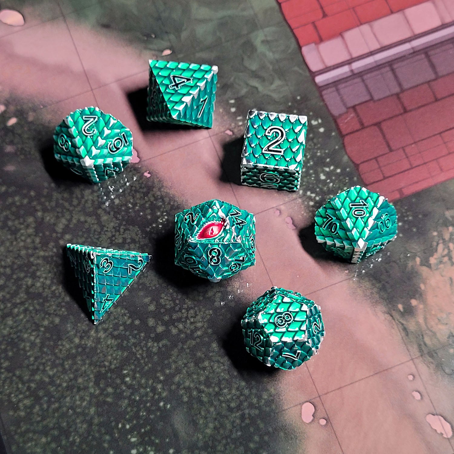 This is an environmental image of the Forged Gaming Dragon's Gaze Silver Green metal RPG dice set. The photo was taken using the City Streets Encounter Map as a background.