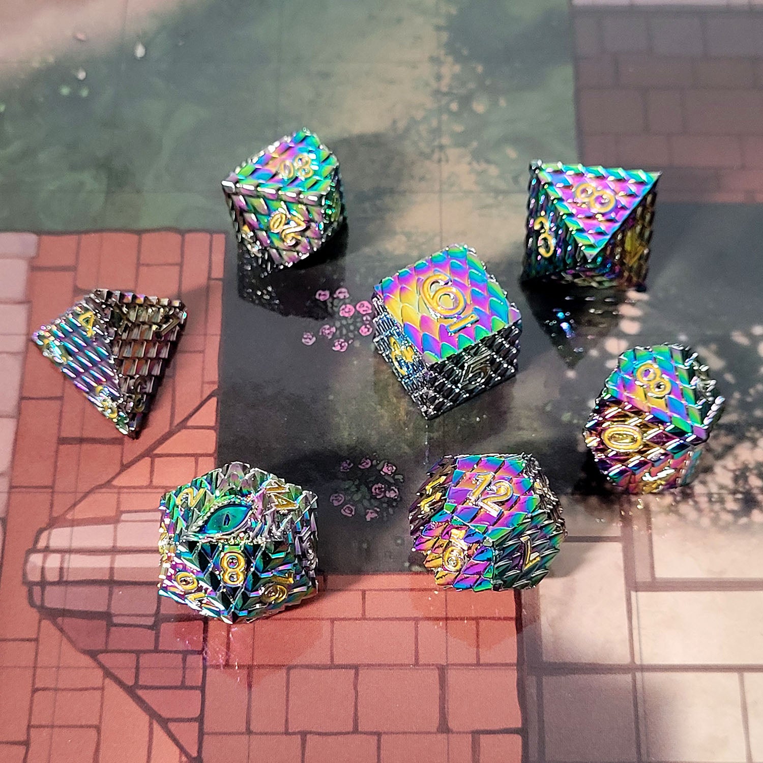 This is an environmental image of the Forged Gaming Dragon's Gaze Iridescent metal RPG dice set. The image was taken using the City Streets Encounter Map as a background.