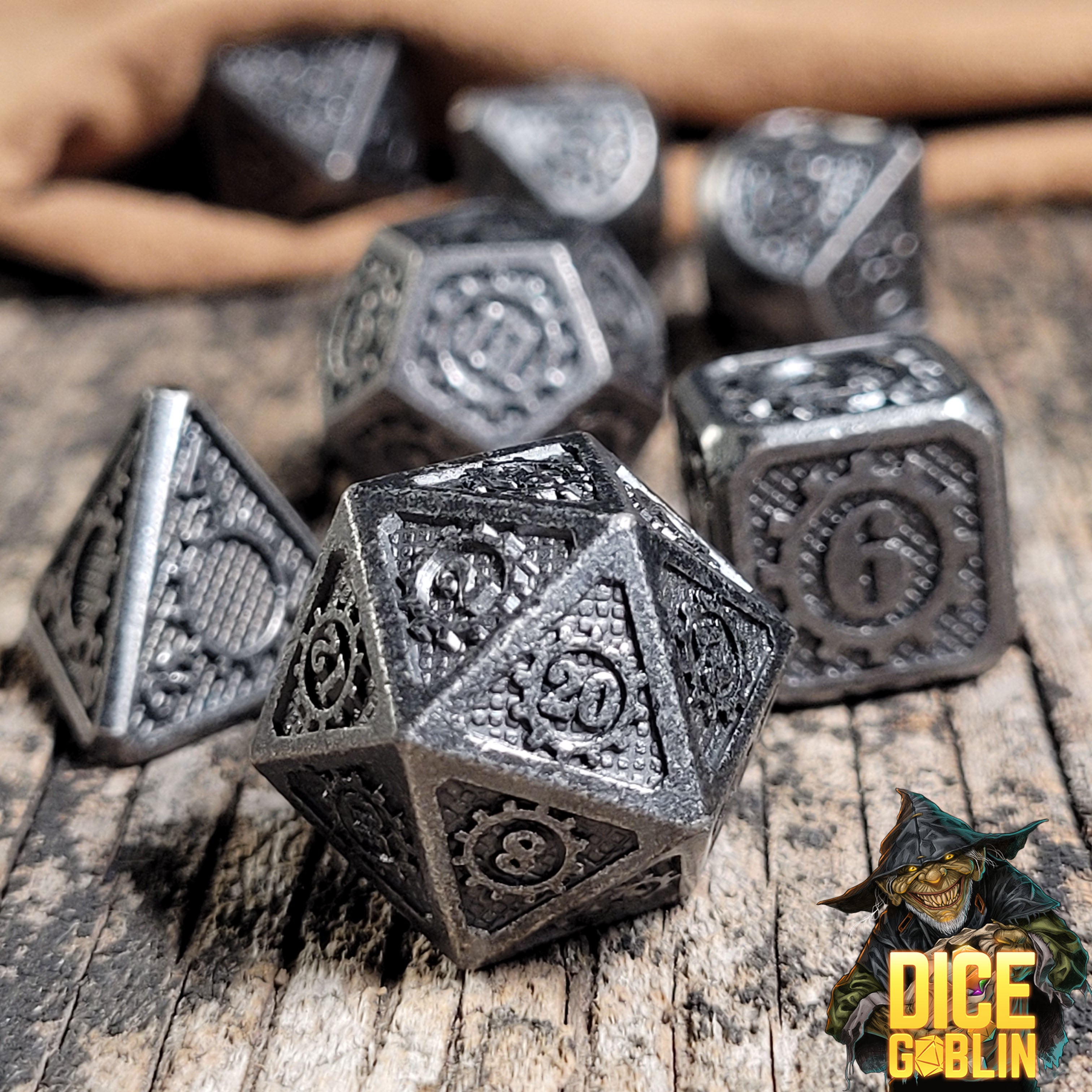 This is an environmental image of the Dice Goblin Gears Iron Metal RPG Dice Set on a distressed wood surface.