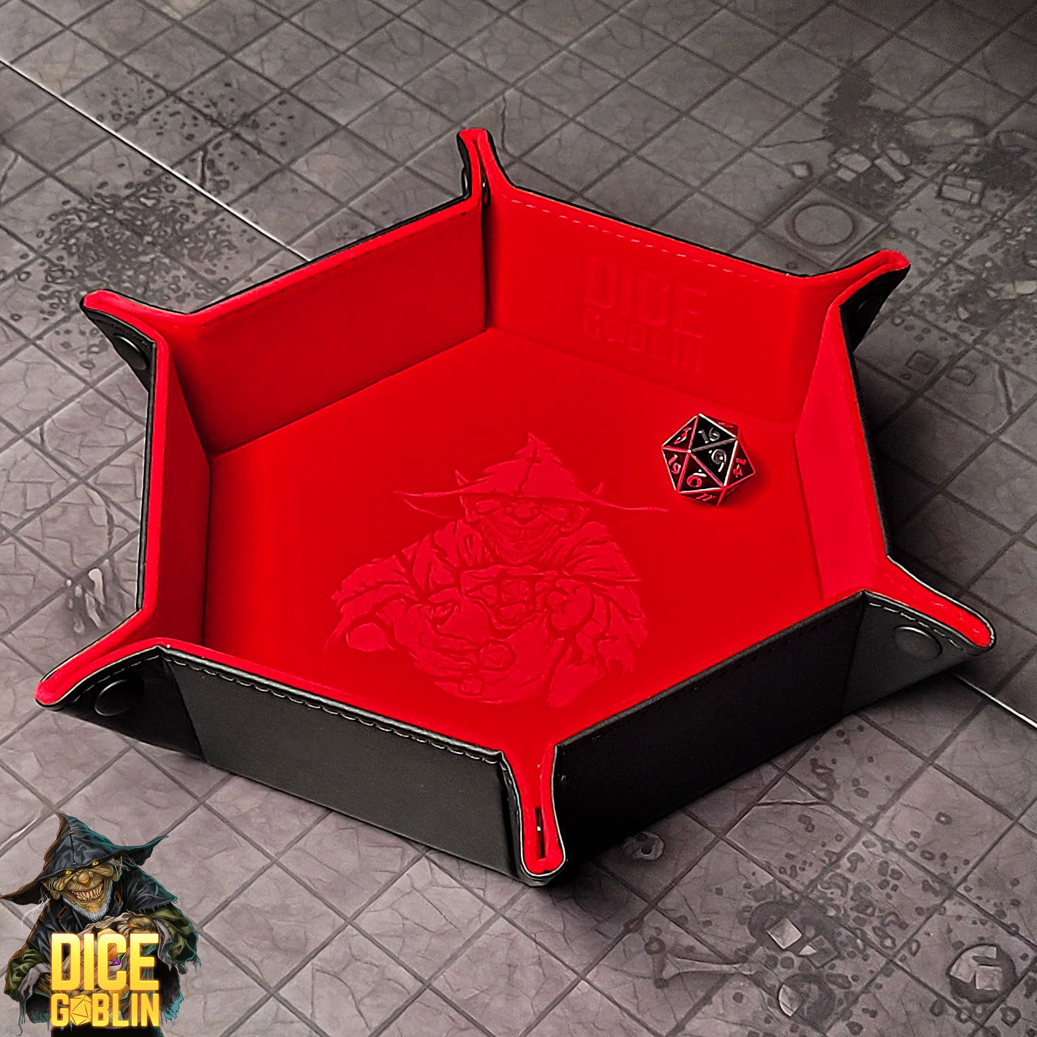 This is an environmental image of the Red colored Dice Goblin Hexagon folding Snap Dice Tray with a dungeon encounter map as a background.