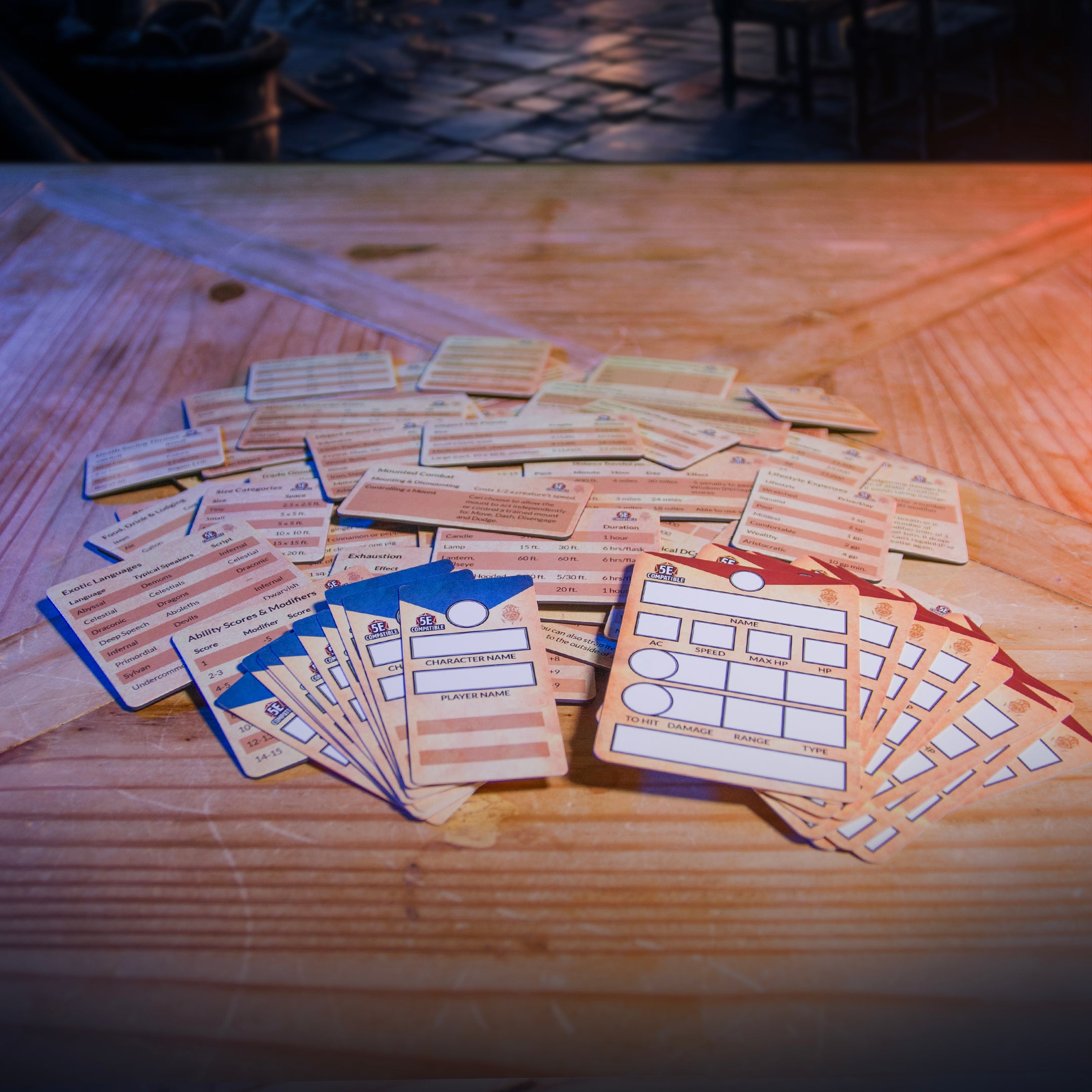 This is an environmental photograph of the contents of the Ultimate Game Master Screen (D&D) 5th Edition Rules Pack