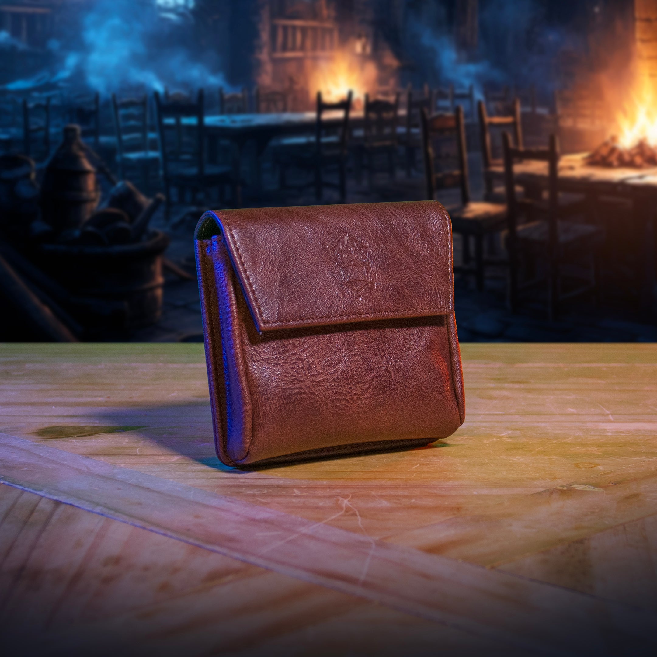 This is an environmental image of the brown version of the Ultimate Game Master Screen Small Pouch displayed on a table.
