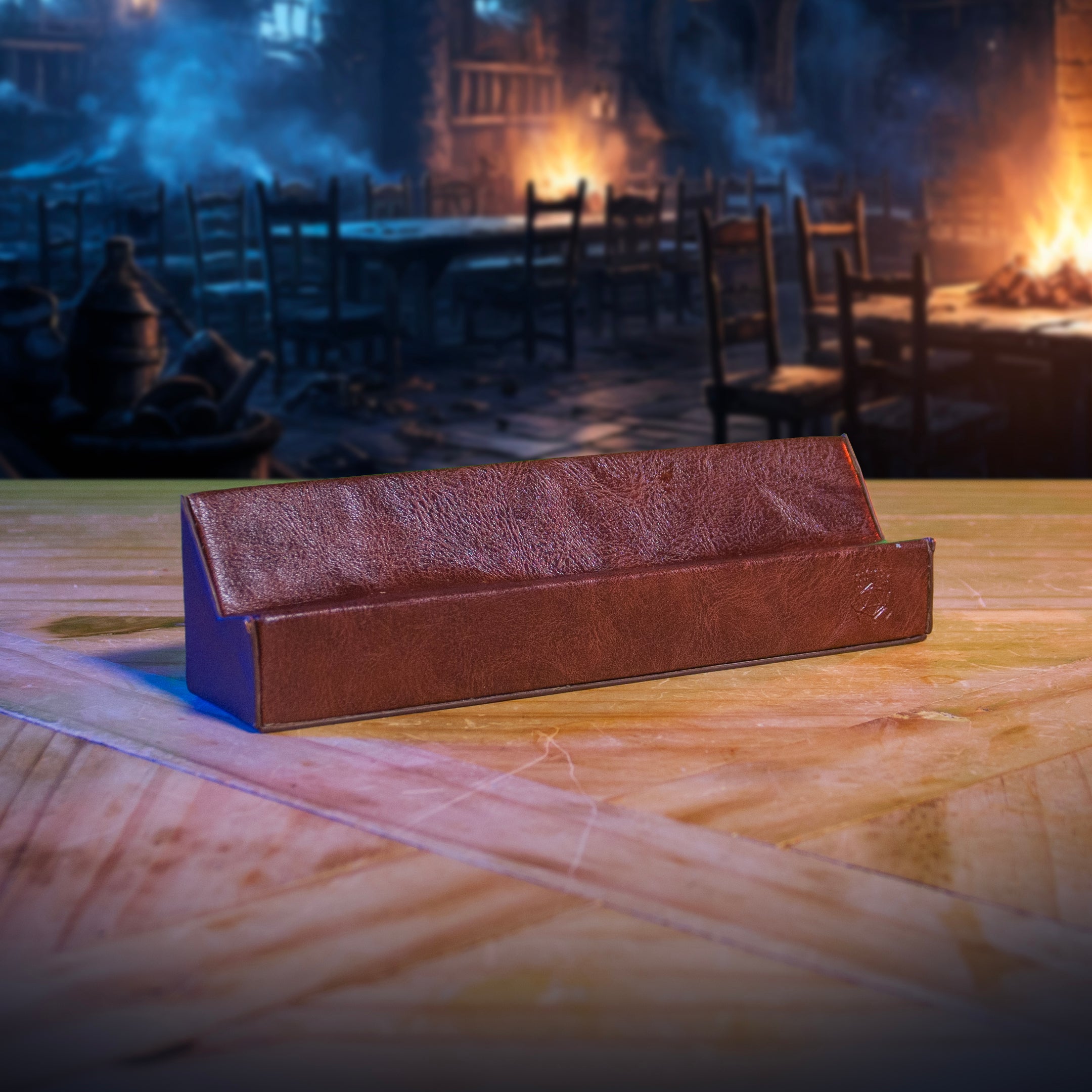 This is an environmental image of the brown version of the Ultimate Game Master Screen Tablet Holder displayed on a table.