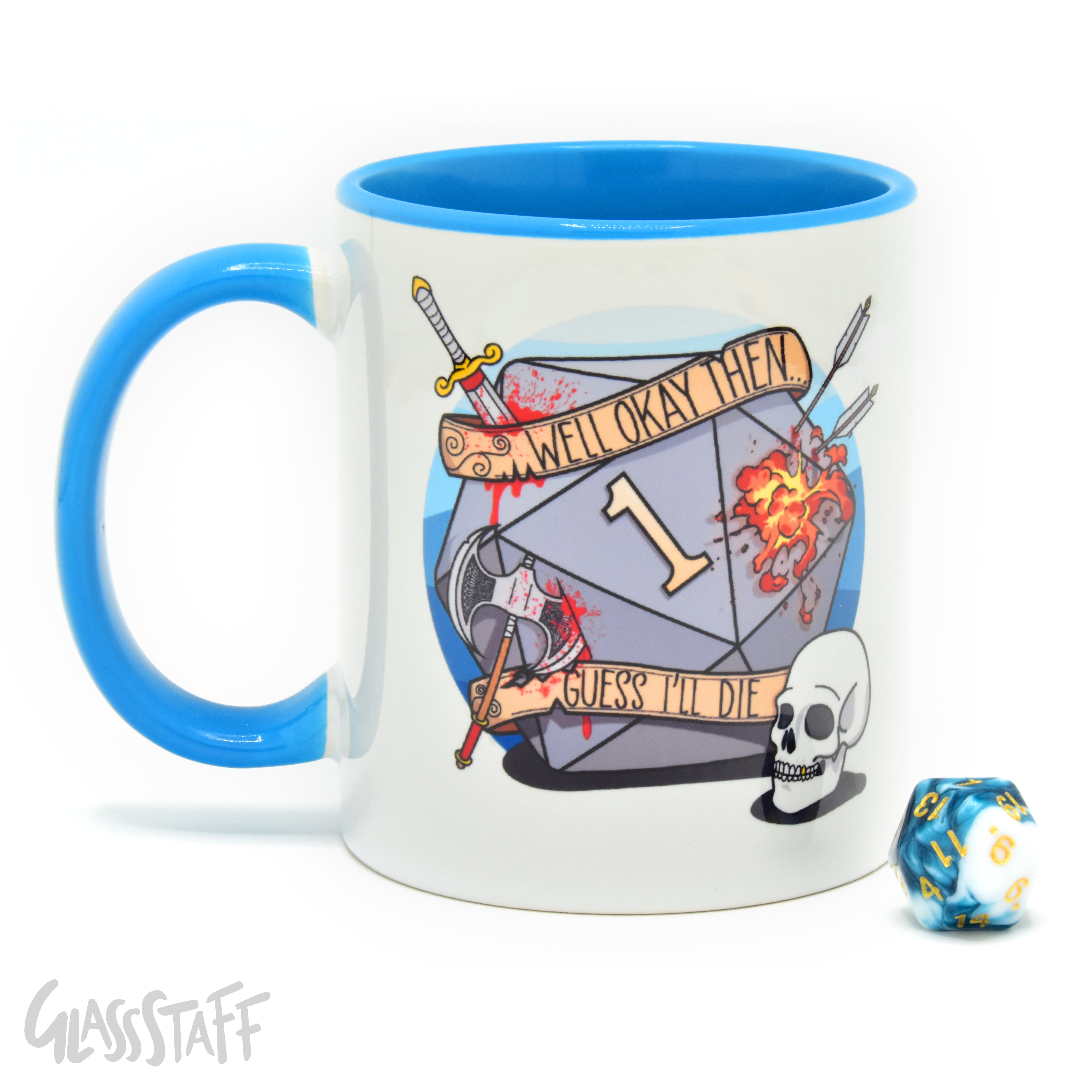 This is a white background image of the GLassStaff Guess I'll Die ceramic mug. It shows the white mug with a blue handle, blue inside, and Guess I'll Die design. It also shows the D20 die included with the mug.