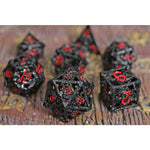 Black and red hollow metal RPG Dice set featuring dragons.